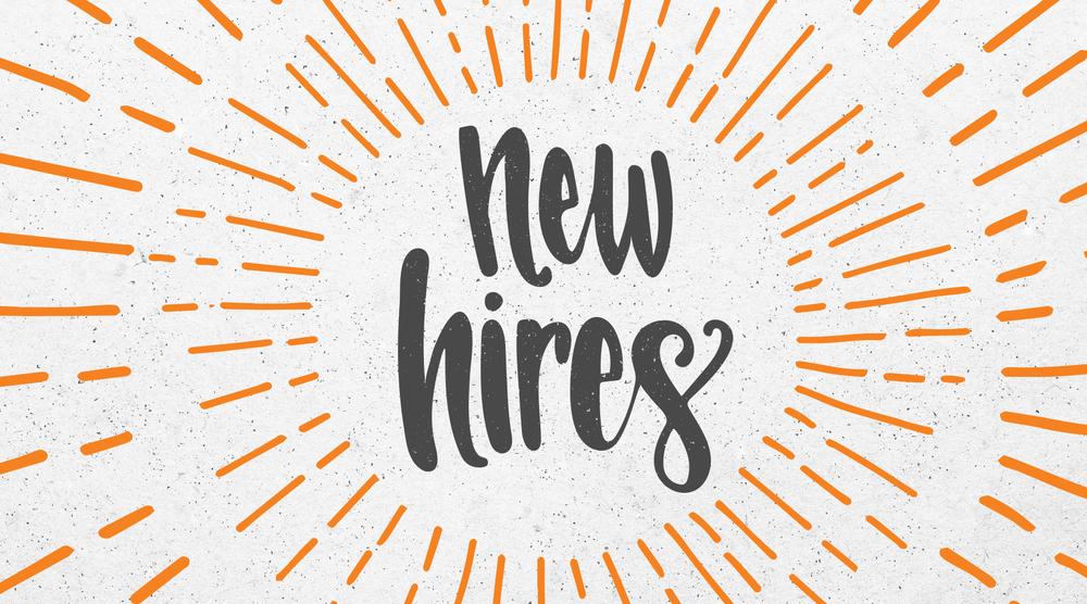 Text "new hires" in black against a light background with sun rays surrounding the text